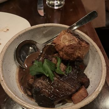 Odd Duck signature dishes Beef Short Rib Carbonnade Flaman Plate Crispy Oyster Mushrooms Plate Duck Confit Enmoladas Plate